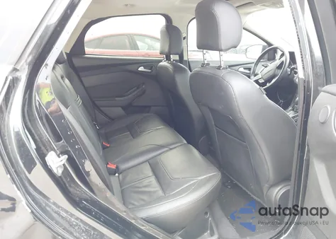 2015 Ford Focus Titanium z USA, uszkodzony, nr VIN 1FADP3N29FL347770